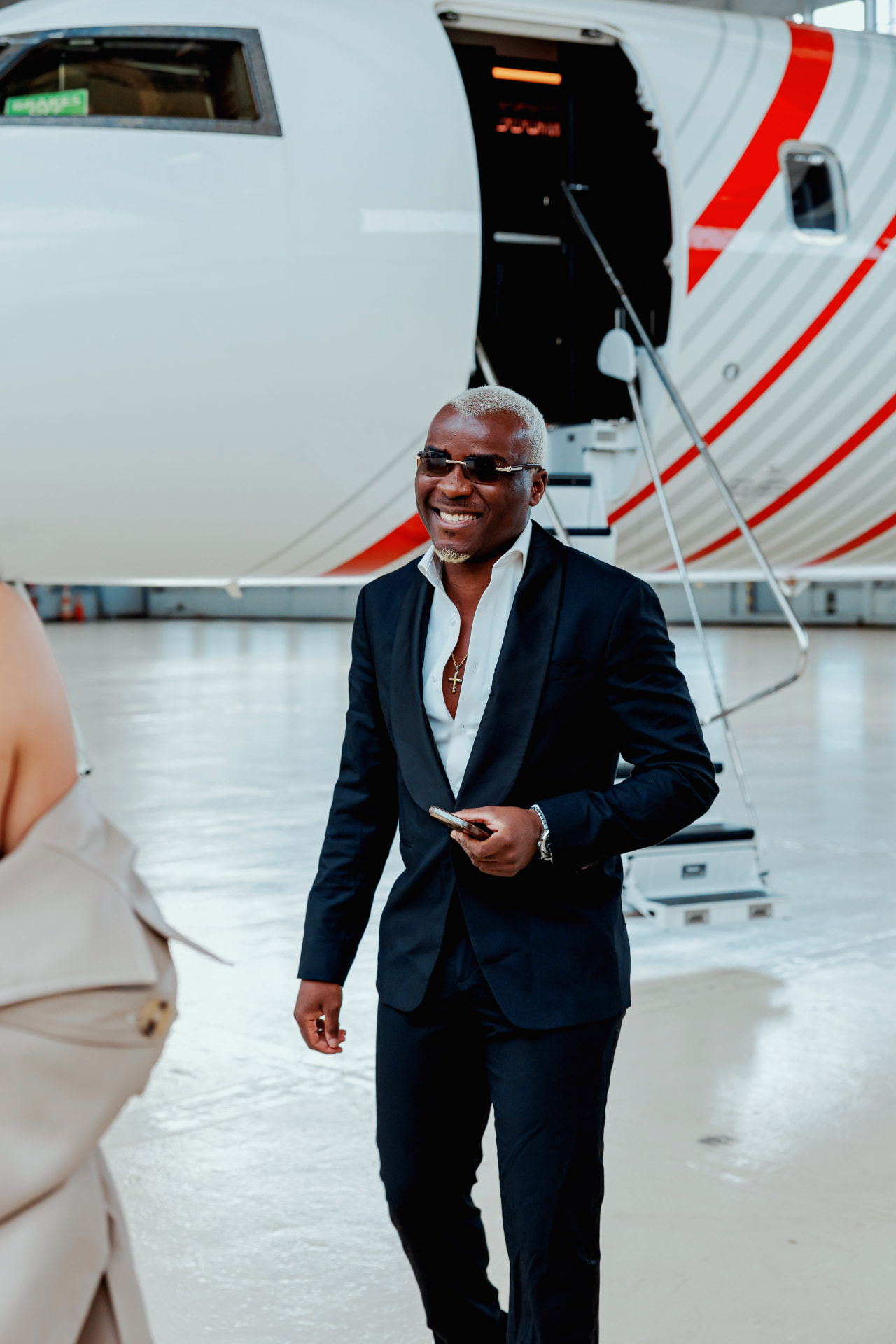 Lucien Ndabagera, Founder and CEO of Lund Group, boarding a private jet
