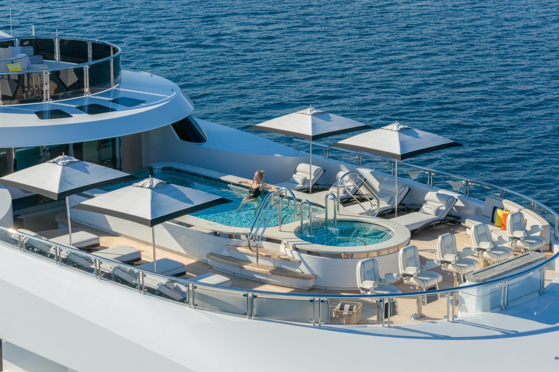 Broker and client reviewing yacht documentation at a quiet waterfront table
