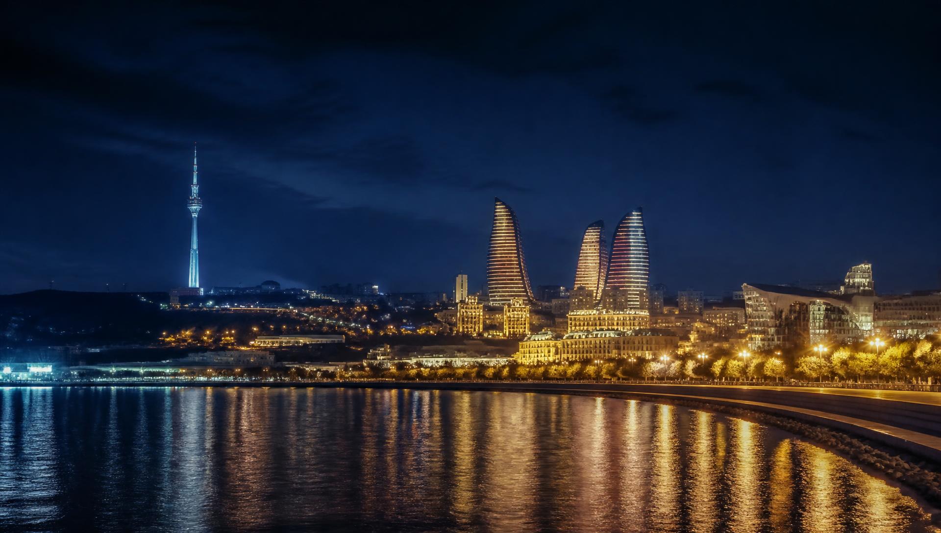 Baku skyline reflected in the Caspian Sea at night