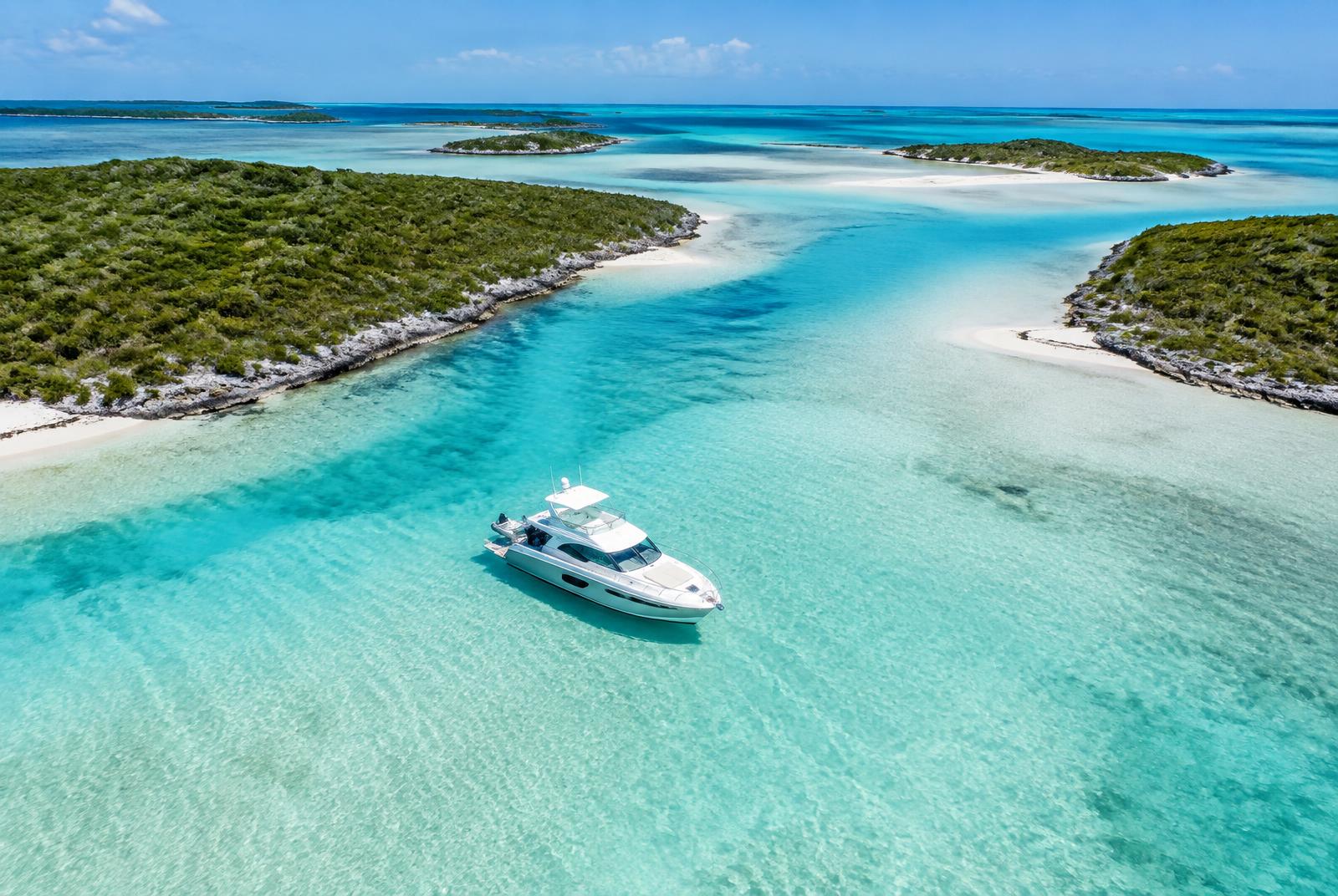 Yacht in shallow turquoise water in the southern Caribbean