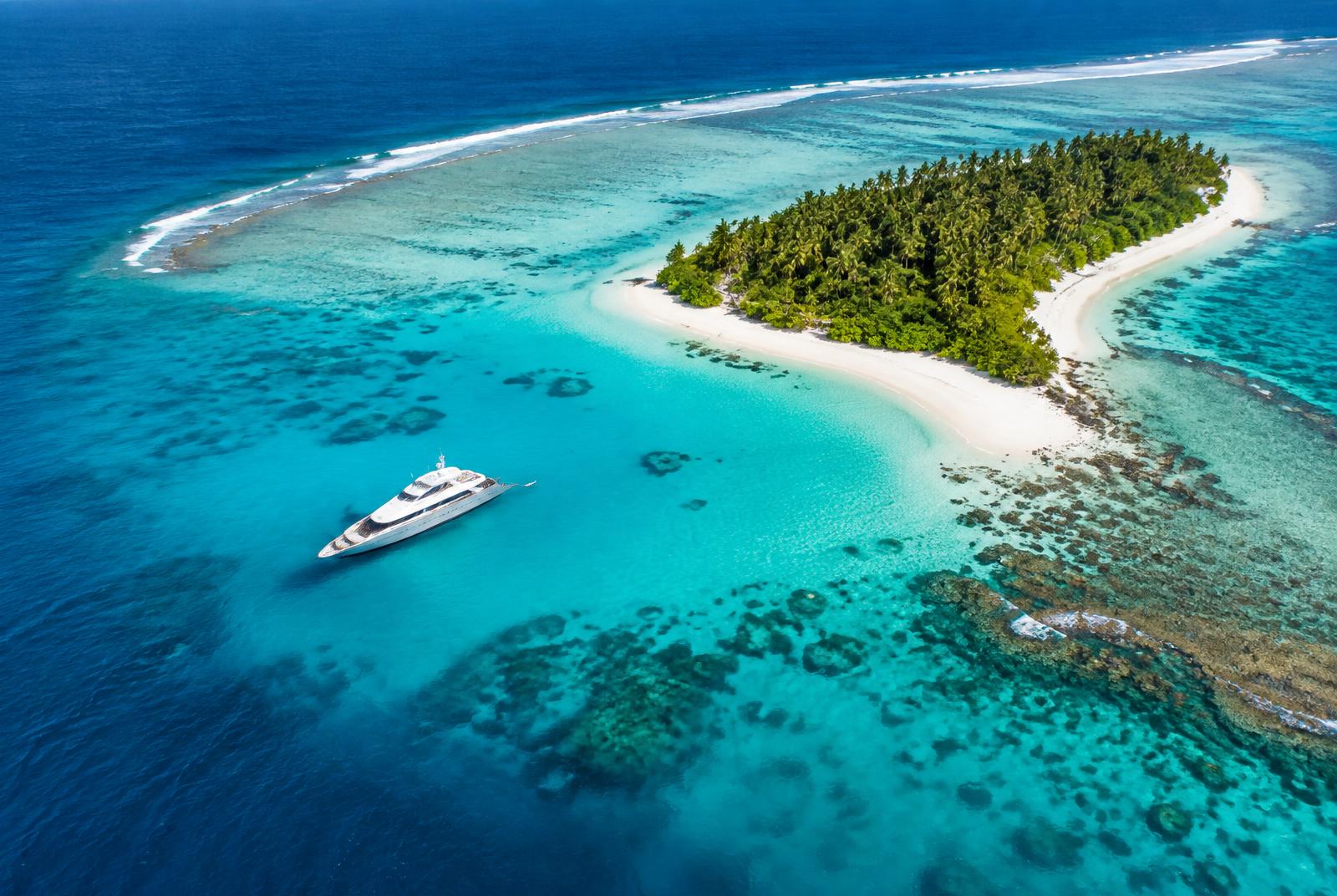 Yacht in a clear Indian Ocean lagoon